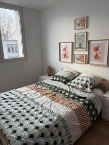 Postel nebo postele na pokoji v ubytování Appartement lumineux et calme Plage et commerces