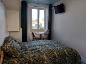 Postel nebo postele na pokoji v ubytování Sérénité