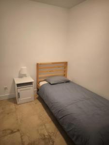 Ένα ή περισσότερα κρεβάτια σε δωμάτιο στο Family's House