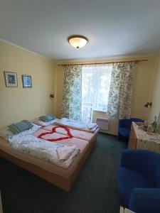 En eller flere senge i et værelse på Horský Hotel Magura + 64 billeder