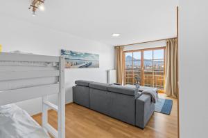 En eller flere senge i et værelse på wolke 7 - traumhafter Bergblick mit Stil - Garage