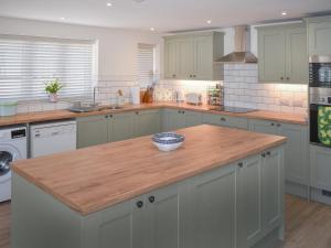 Køkken eller tekøkken på Orchard Lodge