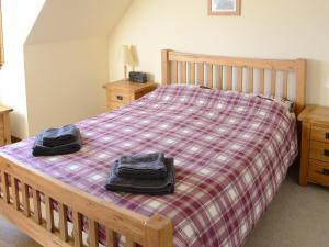 Ένα ή περισσότερα κρεβάτια σε δωμάτιο στο Creagach