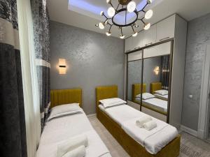 Postel nebo postele na pokoji v ubytování KARE Studio