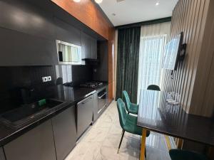 Kuchyň nebo kuchyňský kout v ubytování KARE Studio + 5 fotografií