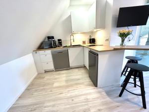 Кухня или мини-кухня в Ferienwohnung Loft Kirchdorf
