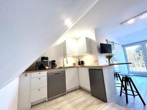 Кухня или мини-кухня в Ferienwohnung Loft Kirchdorf

