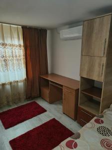 En eller flere senge i et værelse på Casa Razu G2