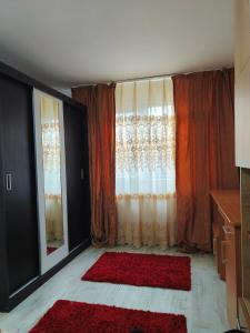 En eller flere senge i et værelse på Casa Razu G2