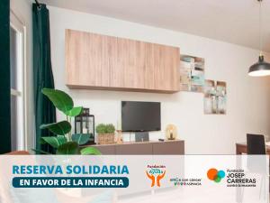 TV a/nebo společenská místnost v ubytování Apartamentos Mikka Mundial + 5 fotografií