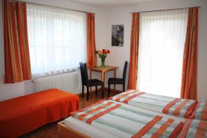 Postel nebo postele na pokoji v ubytování Pension Winter