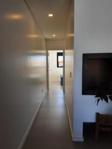 TV a/nebo společenská místnost v ubytování Apartamento completo Centro Garopaba