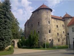 a large stone building with a tower on top of it at Holiday Home Manda in Tounj