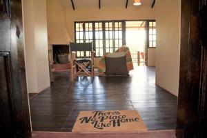 Et opholdsområde på Tea-farm cottage by Aberdare forest river - 2348