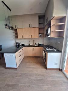 Nhà bếp/bếp nhỏ tại Refugio Urbano, Departamento Luis de Fuentes
