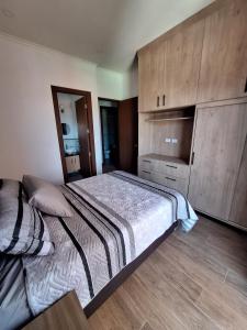 Giường trong phòng chung tại Refugio Urbano, Departamento Luis de Fuentes +4 ảnh