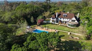 an aerial view of a house with a swimming pool at Mountain view villa heated pool Nyeri - 2352 in Kuhora Twana