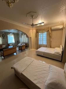 Postel nebo postele na pokoji v ubytování Moon Hostel