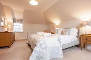 En eller flere senge i et værelse på North Quarter Steading No 11 - Kingsbarns