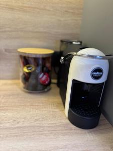 Kaffe- og tefaciliteter på Cozy Center Apartment + 19 billeder