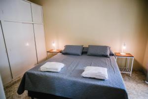 En eller flere senge i et værelse på Donde topa