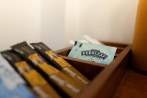 a wooden drawer filled with books and a box at RV Regency 19 Hotel in Tangalle