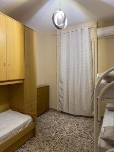 Postel nebo postele na pokoji v ubytování Sperlonga Center Home