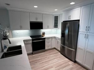 Kuchyň nebo kuchyňský kout v ubytování White Sands #32 + 3 fotografie