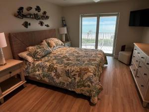 Postel nebo postele na pokoji v ubytování White Sands #32