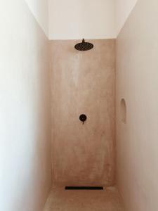 a room with a wall and a ceiling at Together Boutique Villa in Ahangama