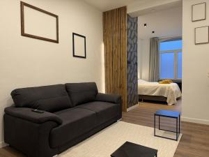 Et opholdsområde på Suite Luxueuse avec jaccuzi sans vis-à-vis + 12 billeder