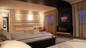 Postel nebo postele na pokoji v ubytování Riad Villa Elizabeth