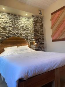 Postel nebo postele na pokoji v ubytování Jasmine joli chapeau A la montagne