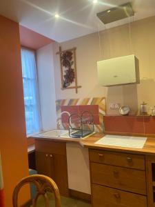 Kuchyň nebo kuchyňský kout v ubytování Jasmine joli chapeau A la montagne