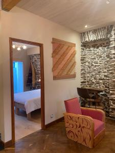 Postel nebo postele na pokoji v ubytování Jasmine joli chapeau A la montagne