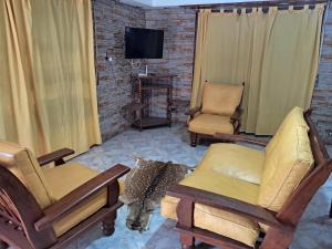 TV a/nebo společenská místnost v ubytování El descanso + 5 fotografií