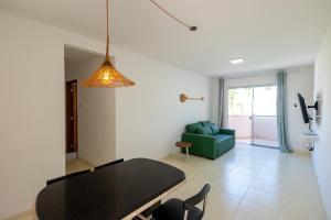 Et opholdsområde på Apto Pe na Areia em Ilheus - Cond Praia da Perola