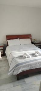 Postel nebo postele na pokoji v ubytování Apartamento Danubio