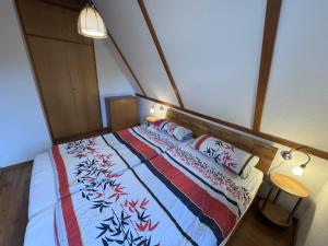 En eller flere senge i et værelse på Twiste Retreat 126