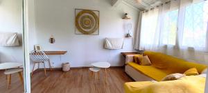 Khu vực ghế ngồi tại Tiny Om tank and pool, work in progress