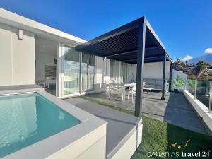 Bazén v ubytování Los Roquitos II nebo v jeho okolí