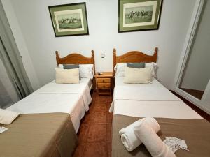 Кровать или кровати в номере Bar Posada Bemi