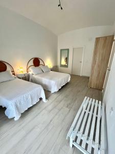 En eller flere senge i et værelse på Señorón & Requesón