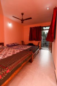 Postel nebo postele na pokoji v ubytování Annu Mane Homestay