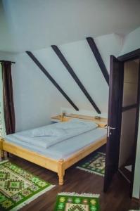 Postel nebo postele na pokoji v ubytování Casa Csiki