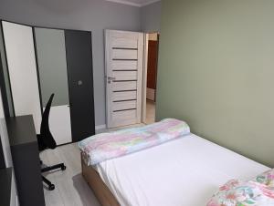 Postel nebo postele na pokoji v ubytování Apartament Barbara