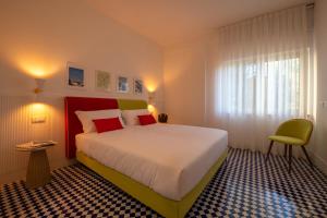 Postel nebo postele na pokoji v ubytování Villa Bellarosa + 10 fotografií