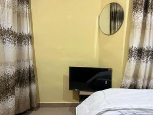 TV a/nebo společenská místnost v ubytování E&V APARTMENT Berger Express