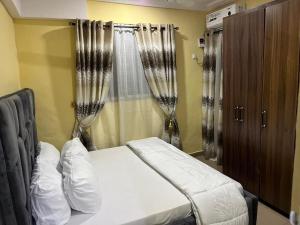 Postel nebo postele na pokoji v ubytování E&V APARTMENT Berger Express