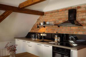 Η κουζίνα ή μικρή κουζίνα στο Apartmán Pod Trámy